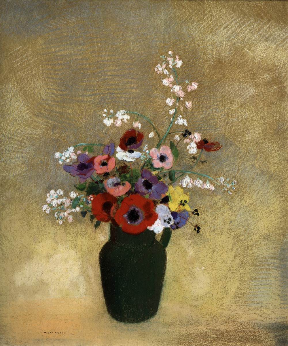 Grand vase vert avec des fleurs
