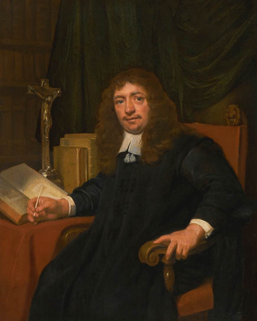 Portrait d'un homme assis à une table dans son étude