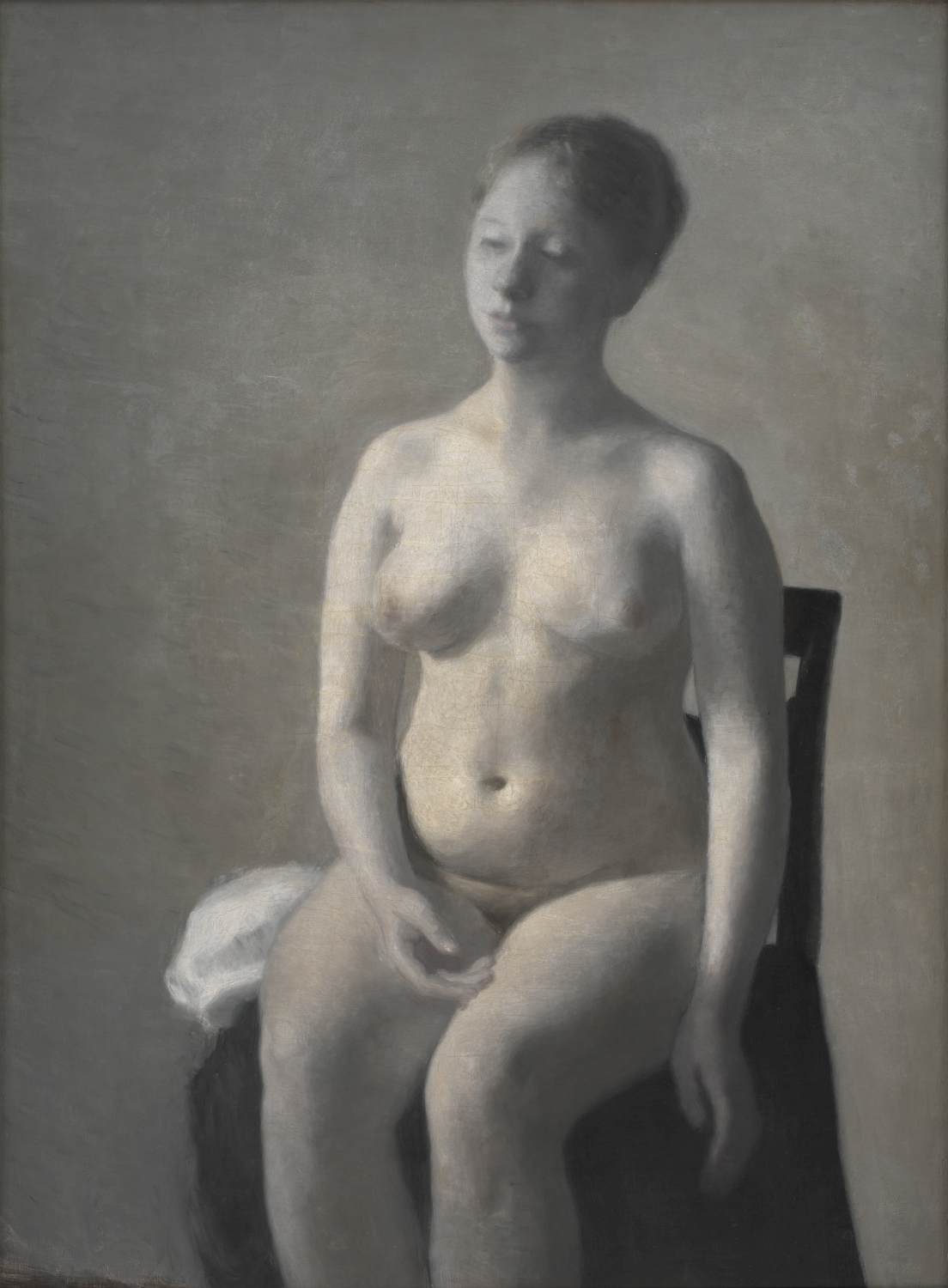 Femme nue assise