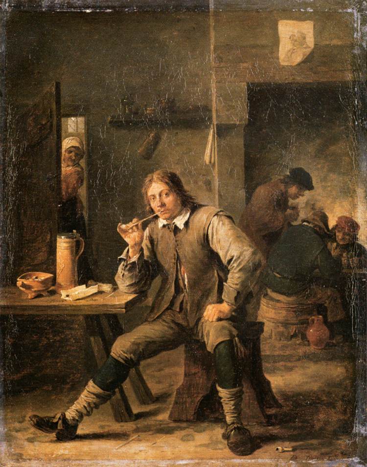 Fumeur appuyant son coude sur une table